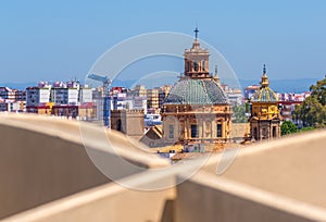 Wiew of the city of Seville with one church from the Metropol Parasol Seville Mushrooms, Seville, Andalusia, Spain