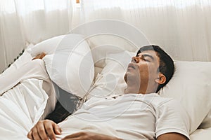 Wife can`t sleep Because the husband snores loudly on bedroom in morning.
