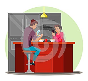 Wife and husband eating breakfast surfing internet