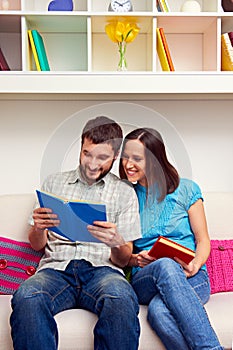 Wife and husband reading the book