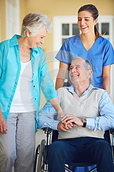 Wife, nurse laughing or old man in wheelchair in hospital clinic helping an elderly patient for support. Funny, happy or