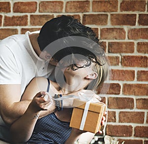 Wife receives a gift box from her husband