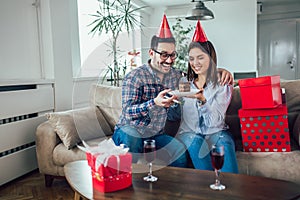 Wife surprise his husband with birthday cake .Anniversary