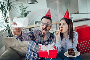 Wife surprise his husband with birthday cake .Anniversary