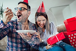 Wife surprise his husband with birthday cake .Anniversary