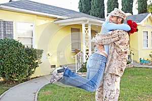 Wife Welcoming Husband Home On Army Leave