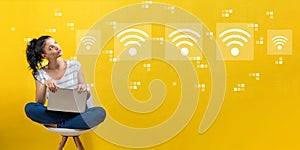 Wifi concept with woman using a laptop