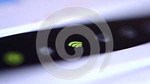 The wifi icon flashes green on the router