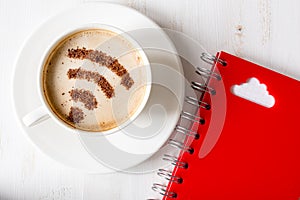 WiFi symbol made of cinnamon in cuppuccino and Cloud computing symbol