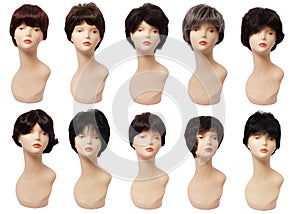 Wig of hair on the mannequin, plastic head. Isolated on white background