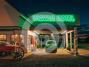 The Wigwam Hotel vintage neon sign at night, on Route 66 in Holbrook, Arizona