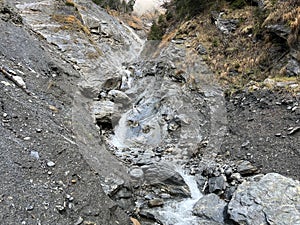 Wild alpine stream Tellerbach in the Calfeisental valley and in the UNESCO World Heritage Tectonic Arena Sardona / UNESCO-Welterbe