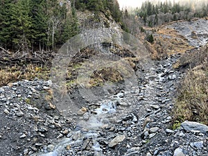 Wild alpine stream Tellerbach in the Calfeisental valley and in the UNESCO World Heritage Tectonic Arena Sardona / UNESCO-Welterbe