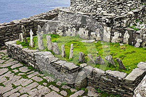 Wild Atlantic Way: High above the wild Atlantic Ocean, Ancient Irish Christian Monks` Graveyard photo