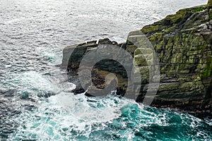 Wild Atlantic Way Ireland: Dramatic breaking waves crash onto Skellig Michael`s jagged rocks
