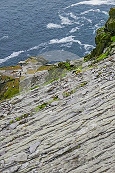 Wild Atlantic Way Ireland: Stunning view -- climbers return to sea level from Skellig Michael`s ancient unprotected staircasese
