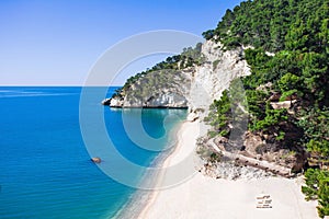 Wild beach in the Gargano Baia delle Zagare beach, Italy photo