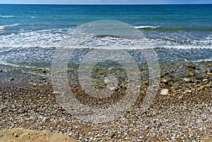 Wild beach on mediteranian sea photo