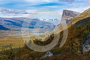 Wild, beautiful arctic landscape of northern Sweden. Skierfe mountain and Rapa river valley in early autumn. Sarek