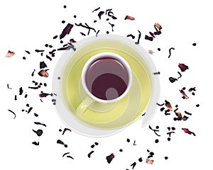 Wild berry tea in green cup with hibiscus leafs