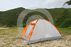 Wild camping on beach with tent