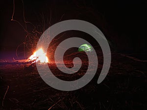 Wild camping spot with a bonfire