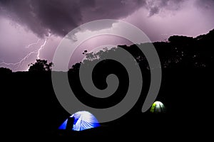 Wild camping under thunderstorm in the mountains