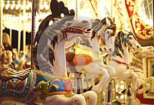 Wild carousel horses at night