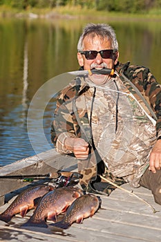 Wild Fisherman with Brookie Catch