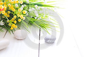 Wild flower posy over distressed wooden background. Wild flowers bouquet on a white wooden