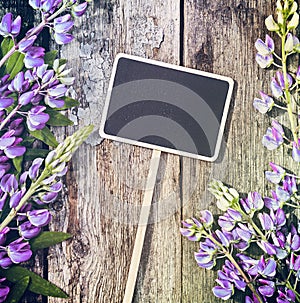 Wild flowers and a blackboard