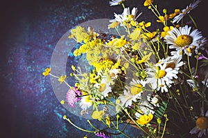 Wild Flowers Bouquet on Rustic Dark Background