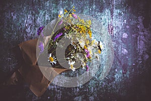 Wild Flowers Bouquet on Rustic Dark Background