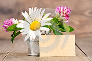 Wild flowers bouquet in tinplate pail