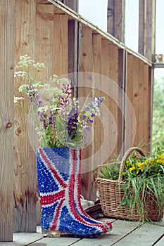 Wild flowers in Union Jack rubber boots-wellies