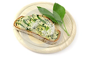 Wild garlic butter on slice of bread. breakfast