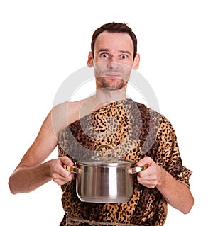 Wild man with cooked food in a stew pan