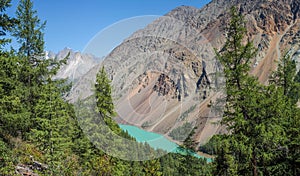 Wild mountain gorge with a lake