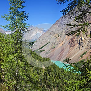 Wild mountain gorge with a lake