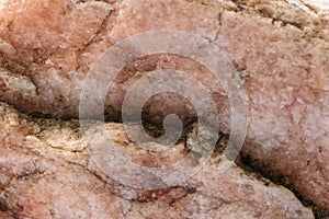 Wild natural pink marble stone surface texture, as abstract geologic mineral background