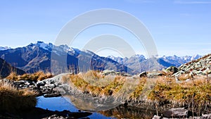 Wild and picturesque mountain landscape in the Swiss Alps on a beautiful day in late autumn with mountains and a great view and a