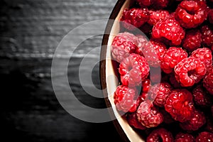 Wild raspberries in a bowl.