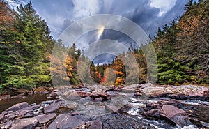 Wild River in the Appalachian Mountains during peak Autumn Colors