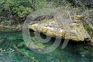 _JP01374-green hole where a river flows