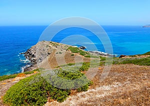 Wild rocky cliff on the coast of Sardinia, Torre dei Corsari