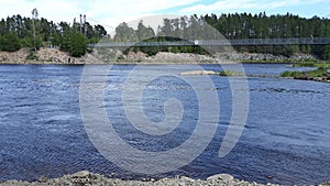 Wild salomon river in natural park in Sweden