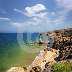 Wild seashore with fancy weathered cliffs