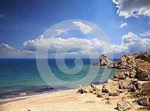 Wild seashore with fancy weathered cliffs