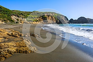 Wild shore view close to Rodeo Beach in California photo