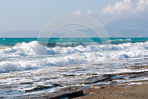 Wild stony beach of Aegean Sea, Rhodes island - Greece